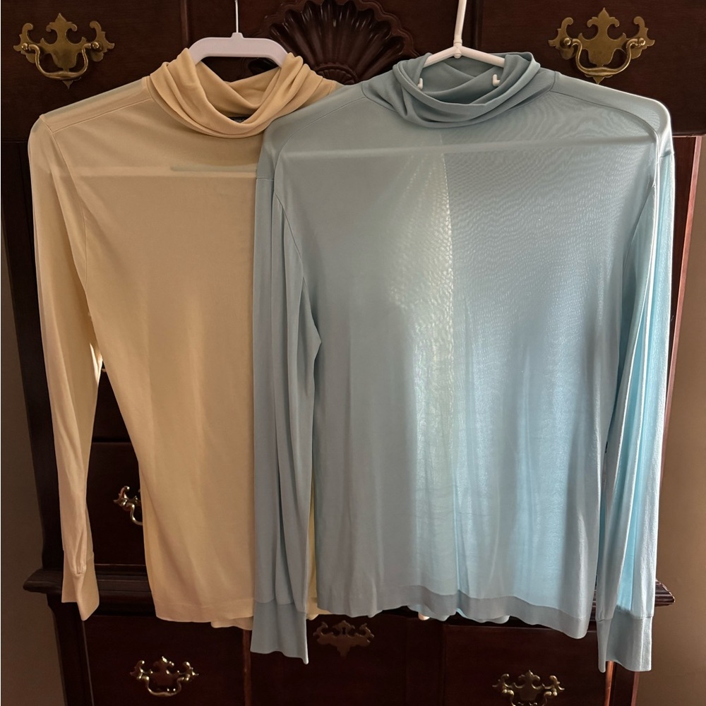 100% silk floppy neck/turtle neck blouses. Size M.